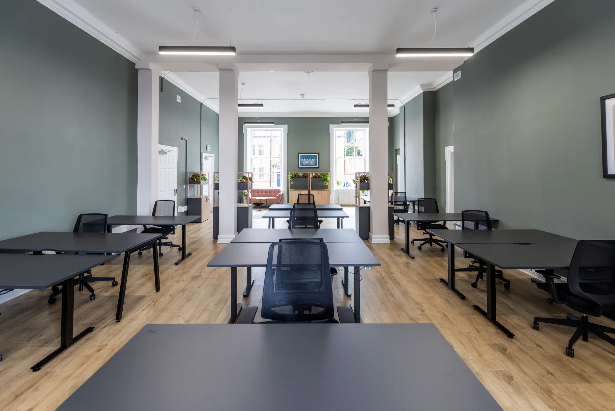 A long view through the columns of the open office